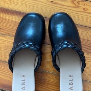 Able black leather clogs